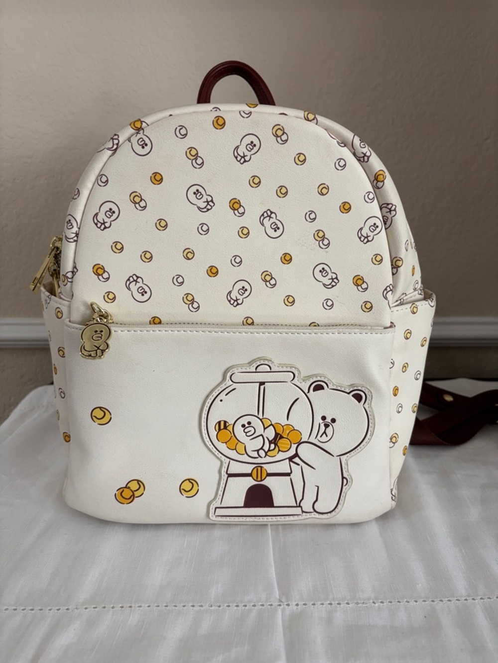 White Character Mini Backpack with Yellow Accent